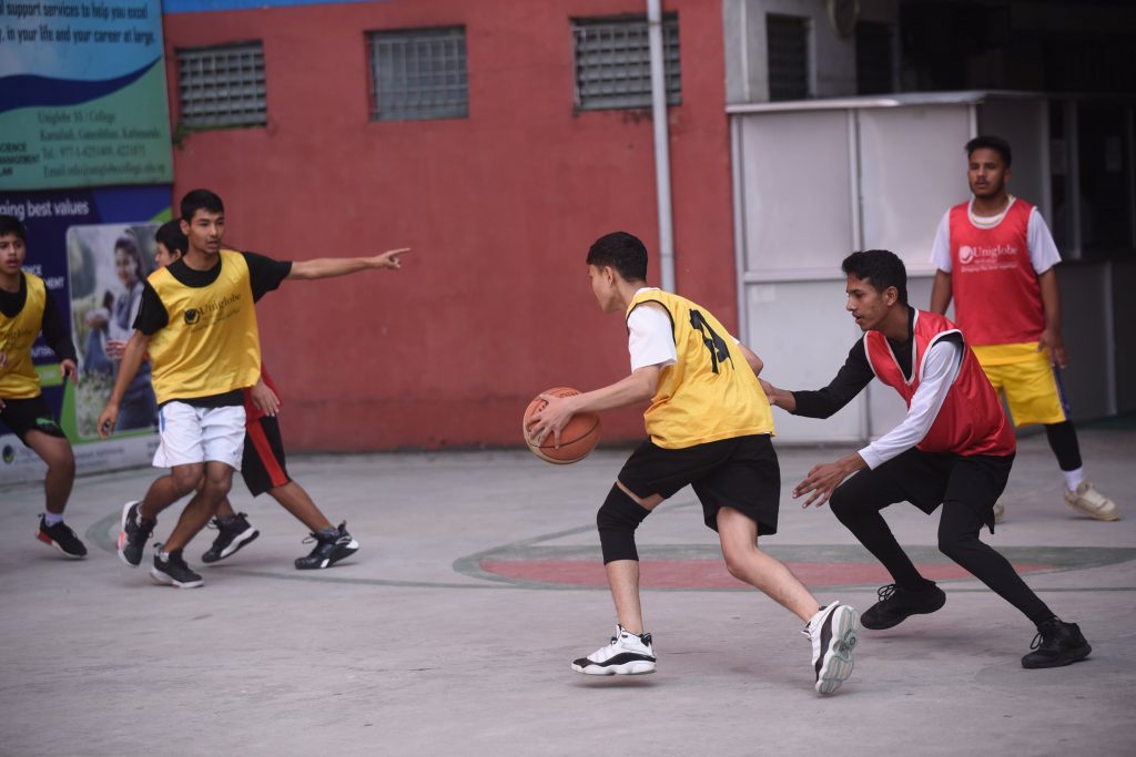 Uniglobe SS- Students Playing Basket Ball
