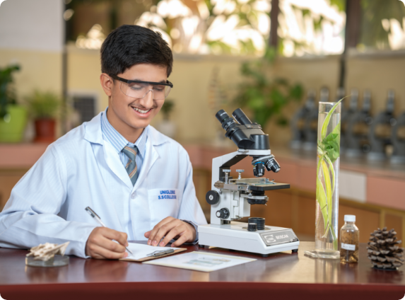A Boy Watching From Microscope