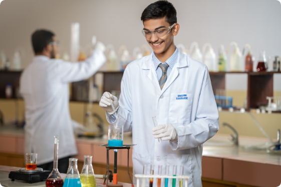 Uniglobe SS- A boy in Chemistry Lab